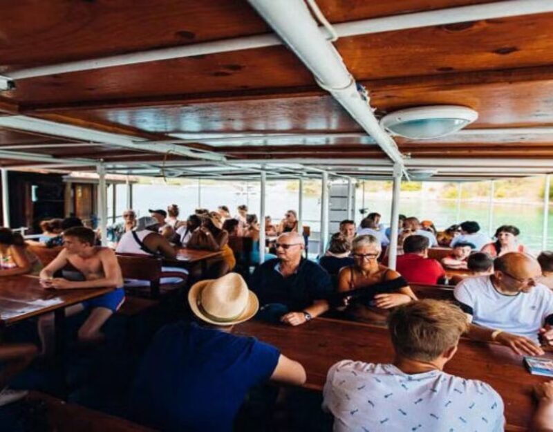 Split: Blue Lagoon Boat Trip with Lunch, Wine and Snorkeling - Food, Drinks, and Entertainment on Board