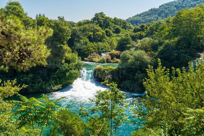 Split: Krka Waterfalls Morning/Afternoon with Boat Cruse, Olive Oil & Wine Taste - Discover the Krka Waterfalls Tour from Split