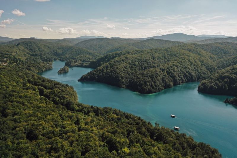 Split: Self-Guided Plitvice Lakes Day Tour with Boat Ride - Electric Train Ride Through the Forest: Comfort Plus Views