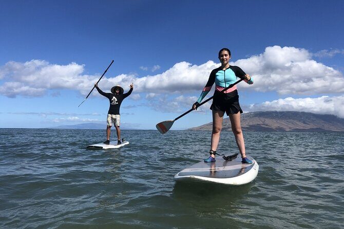 Stand Up Paddleboarding Lessons - The Sum Up