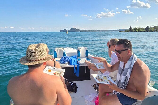 Sunset boat cruise with wine and fish tasting from Garda - Key Points
