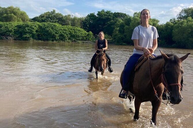 Sunset by horse (river and beach) - The Sum Up