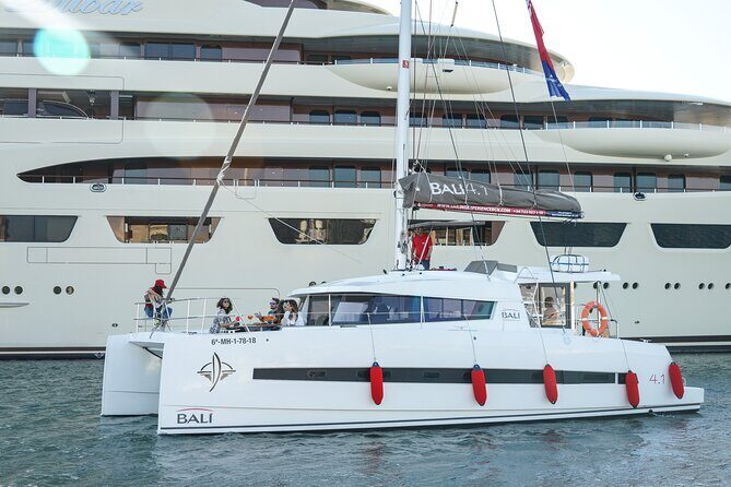 Sunset Catamaran: Small Group, Drinks, Snacks & Dinner Upgrade - The Sum Up