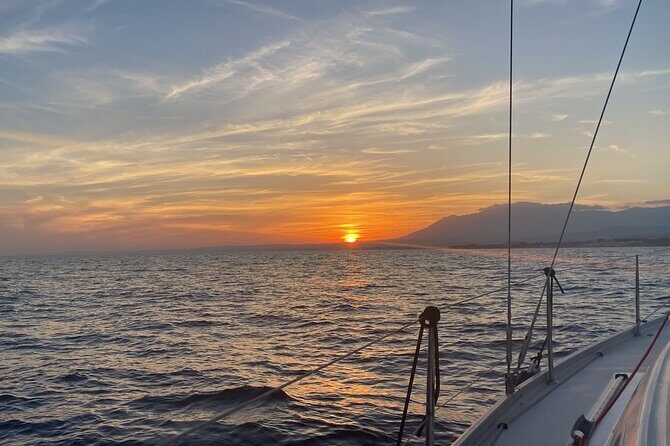 Sunset sailing along the cliffs of Maro- Private - Key Points