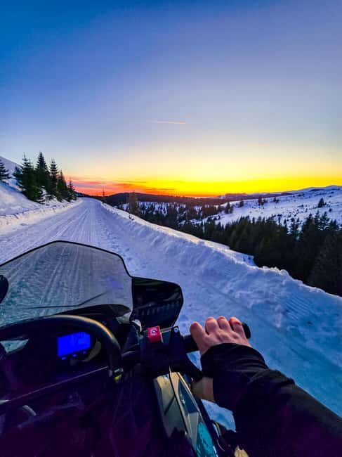Sunset, Snowmobile, Champagne and You in Bucegi Mountains - A Closer Look at the Experience