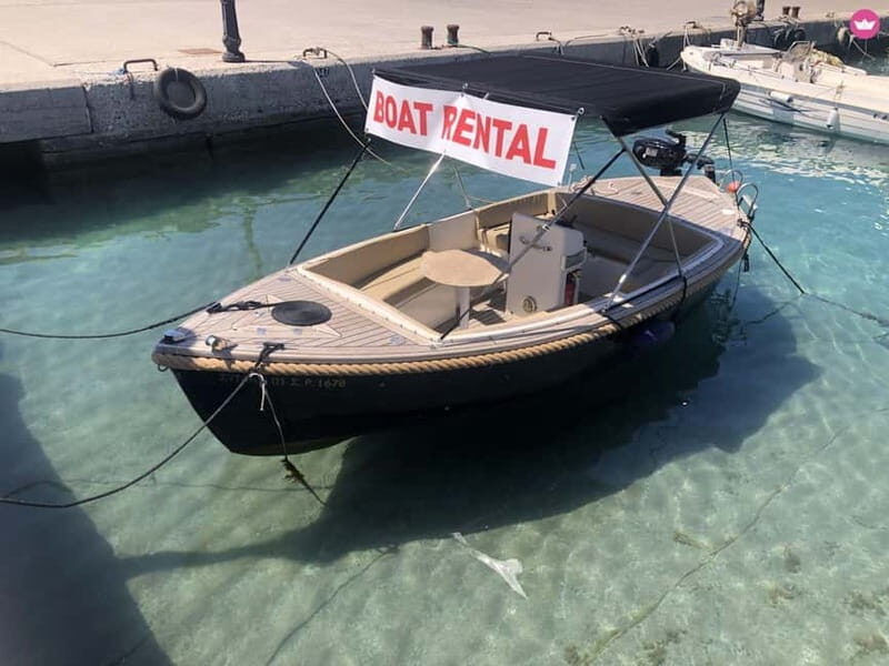 Swim to Antony Quinn bay Ladiko & Traunou caves with skipper - Exploring the Private Boat Tour to Antony Quinn Bay and Caves: A Detailed Look