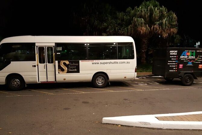 Sydney Airport to Sydney CBD shared ride seat in vehicle shuttle transfer - Authentic Traveler Perspectives