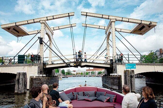 Guided Amsterdam Canal Cruise – Snacks & Drinks on board(1 Hour) - When to Book and What to Expect