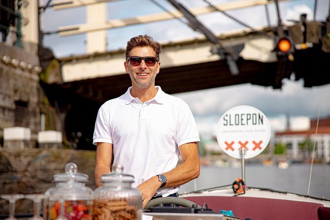 Guided Amsterdam Canal Cruise – Snacks & Drinks on board(1 Hour) - The Bottom Line