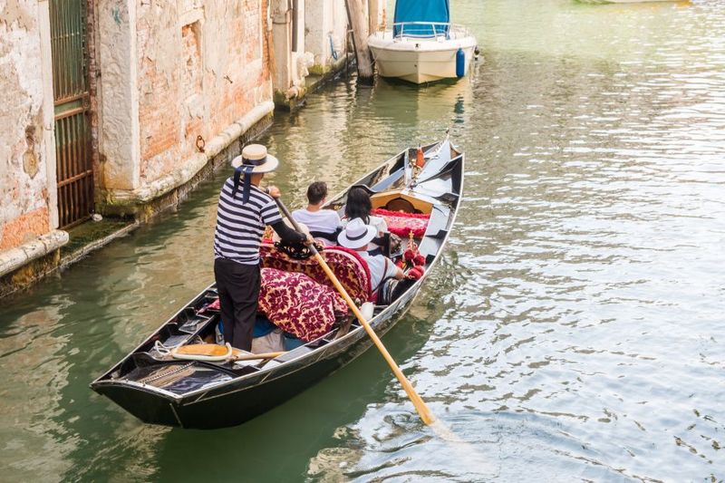 Venice: Shared Gondola Ride Across the Grand Canal - Gondolier Personality: Skillful Rowing, Limited Small Talk