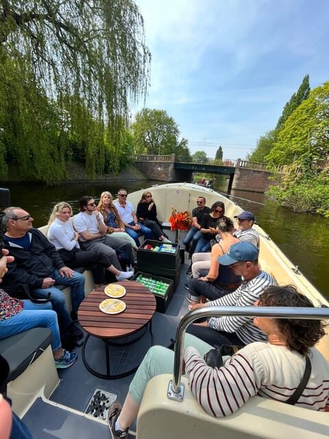 Visit Amsterdam by Boat with a French Guide (french) - Key Points