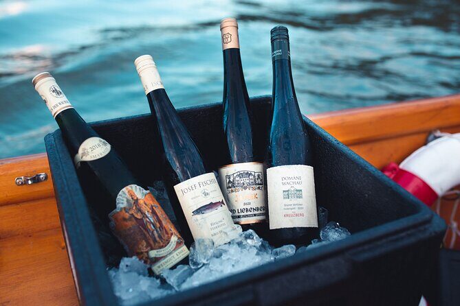 Wine tasting on traditional wooden boats in Wachau Valley - Key Points